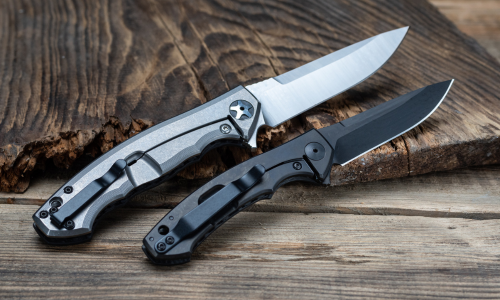Two black pocket knives